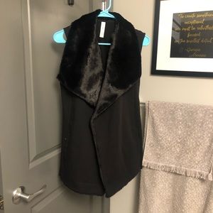 Black faux fur lined vest